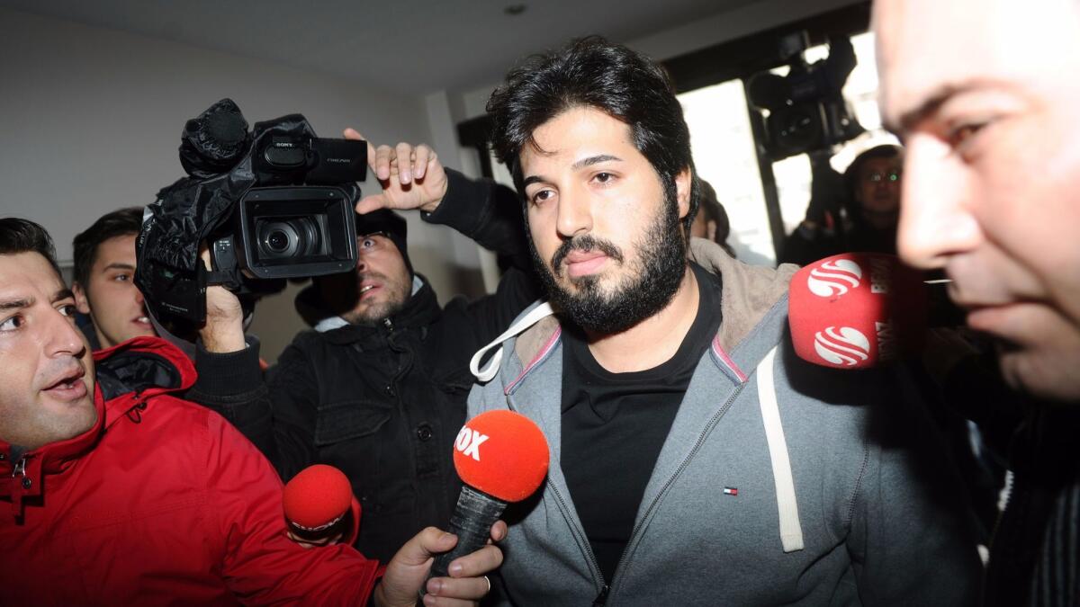Turkish Iranian gold mogul Reza Zarrab arrives at a police center in Istanbul on Dec. 17, 2013.