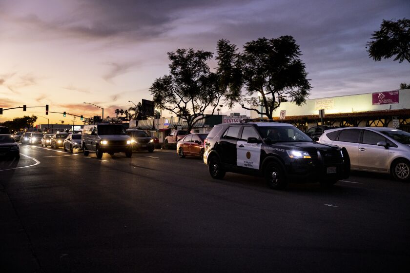 San Diego, CA - January 05: A San Diego Police Department vehicle patrols at sunset along El Cajon Boulevard in the Teralta West neighborhood on Wednesday, Jan. 5, 2022 in San Diego, CA. (Sam Hodgson / The San Diego Union-Tribune)