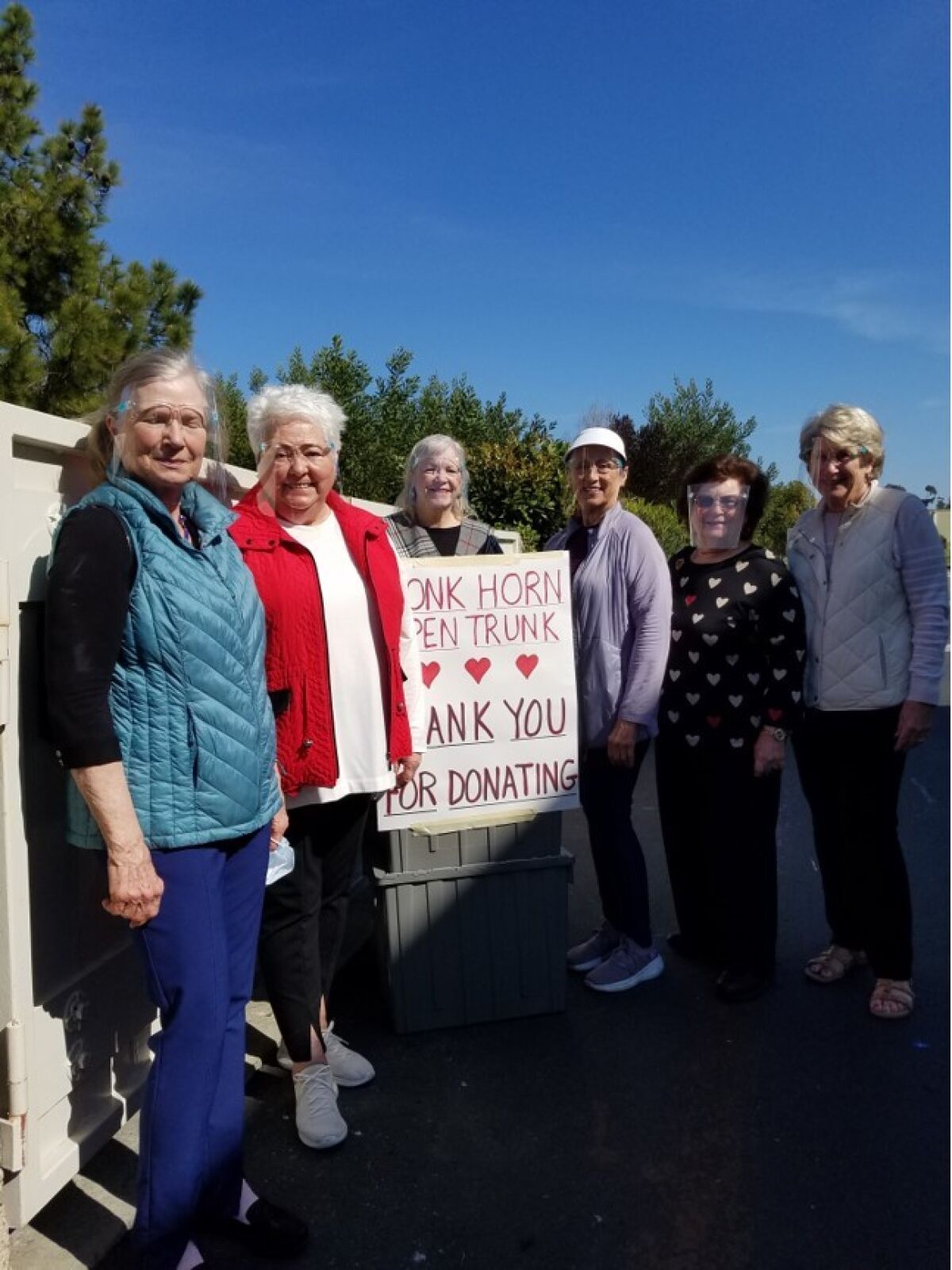 Members of the Carlsbad Newcomer’s Club “Love Your Neighbor”