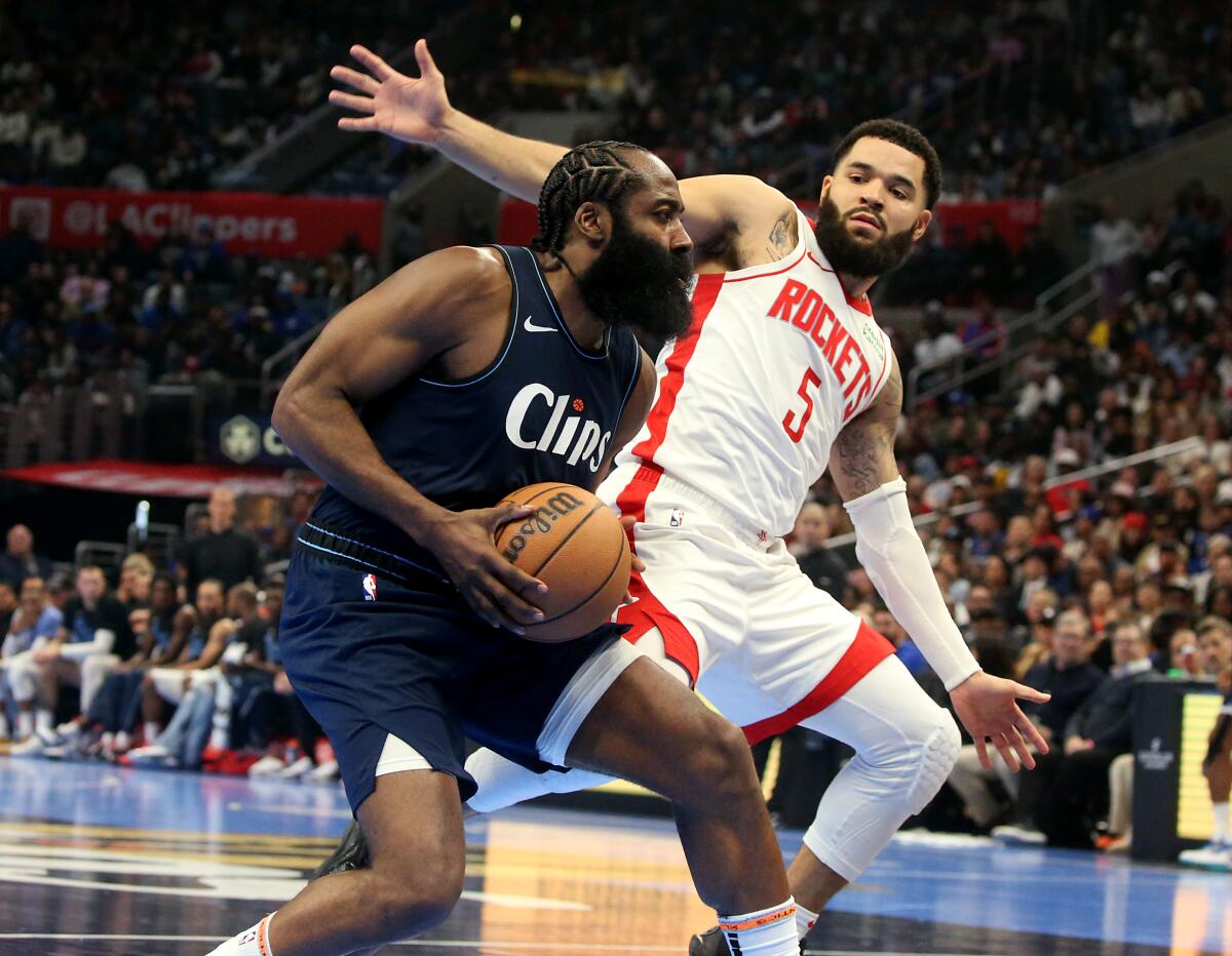 Clippers guard James Harden drives to the basket against Houston guard Fred VanVleet on Nov. 17.