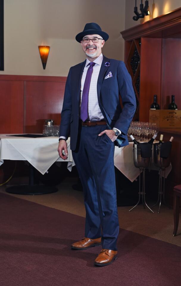 Who: Bill Thrush, 51, Towson resident, Friedman, Framme & Thrush, P.A. managing principal Spotted at: Brains & Brawn charity date auction benefiting Sharp Dressed Man at Fleming’s Prime Steakhouse & Wine Bar What he wore: Light purple window pane shirt, blue-on-blue pin stripe suit, dark purple tie, and purple-and-white pocket square – all from Christopher Schafer; fabric boutonniere from amazon.com; tan oxfords from colehaan.com; and navy fedora from Hats in the Belfry. He appreciates the accessories: “I like attention to the details. It’s the details that make the outfit; the boutonniere, the pocket square, the socks and the feather in the hat.”