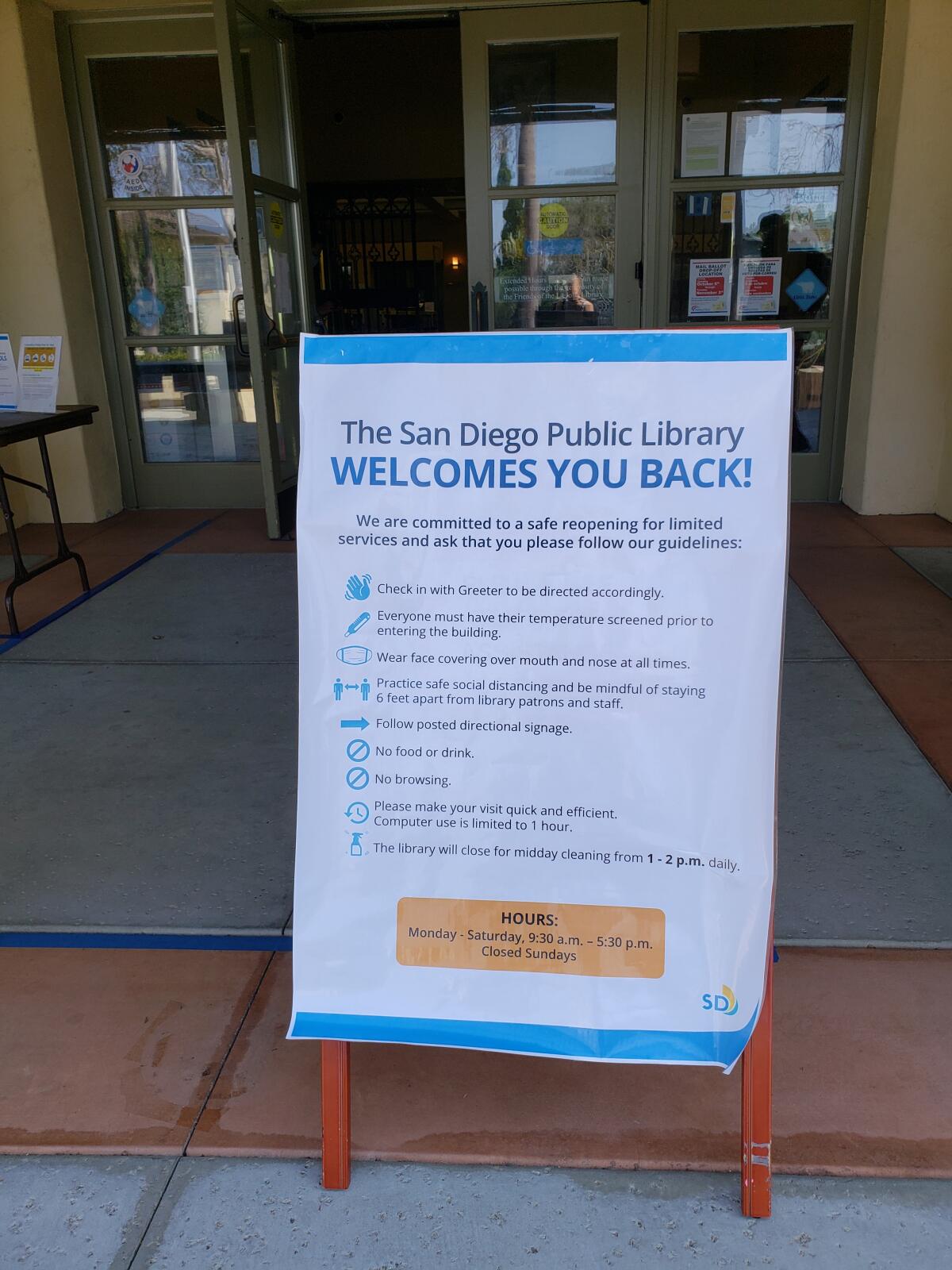 A sign in front of the La Jolla/Riford Library at 7555 Draper Ave. outlines the rules for indoor use.