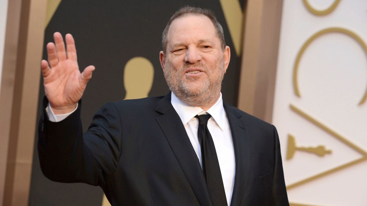 Harvey Weinstein arrives at the 2014 Oscars in Los Angeles.
