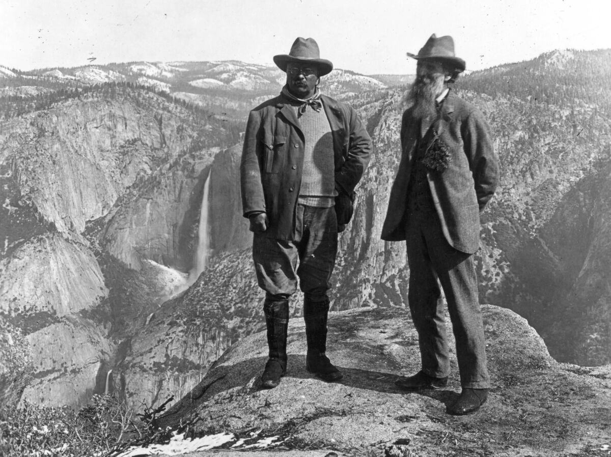 President Theodore Roosevelt, left, with conservationist John Muir at Glacier Point in Yosemite National Park in 1903.