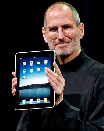 Jobs holds up the iPad, a portable device for reading books, watching video and surfing the Web, at its unveiling in San Francisco. "We think we've got the goods. We think we have done it," he said.
