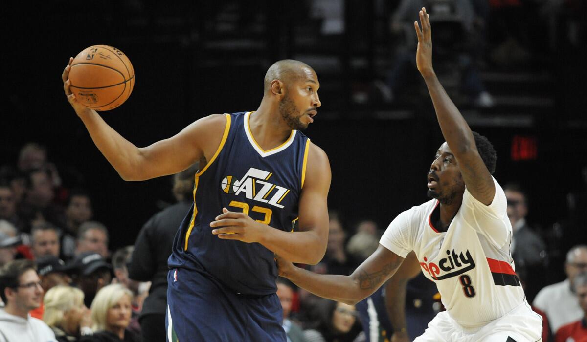 Utah Jazz's Boris Diaw, left, looks to drive on Portland Trail Blazers' Al-Farouq Aminu in the first quarter on Tuesday.