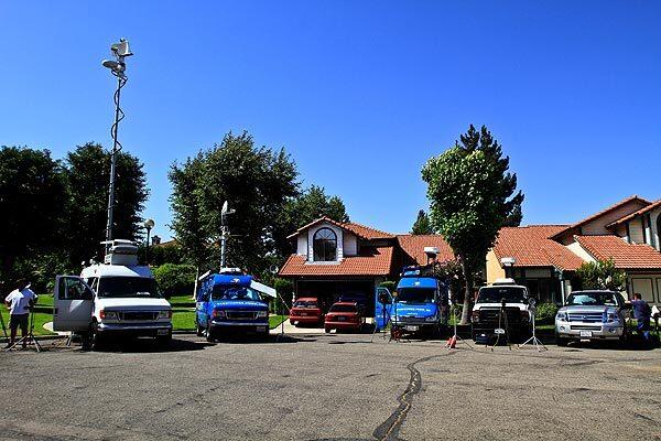 News vans camp out on the quiet Rialto cul-de-sac where two suspects in the beating of San Francisco Giants fan Bryan Stow were arrested Thursday morning. Story