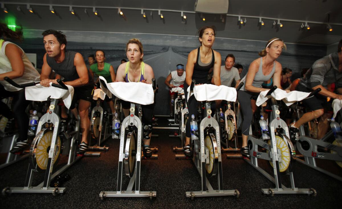 Indoor cycling company SoulCycle will stagger bikes when it reopens.