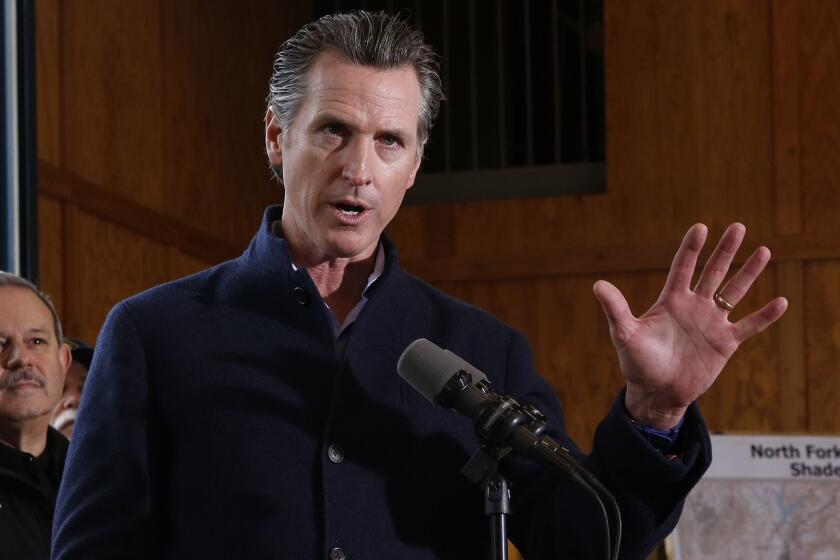 Gov. Gavin Newsom discusses emergency preparedness during a visit to the California Department Forestry and Fire Prevention Colfax station Tuesday, Jan. 8, 2019, in Colfax, Calif. On his first full day as governor, Newsom announced executive actions to improve the state's response to wildfires and other emergencies. (AP Photo/Rich Pedroncelli)