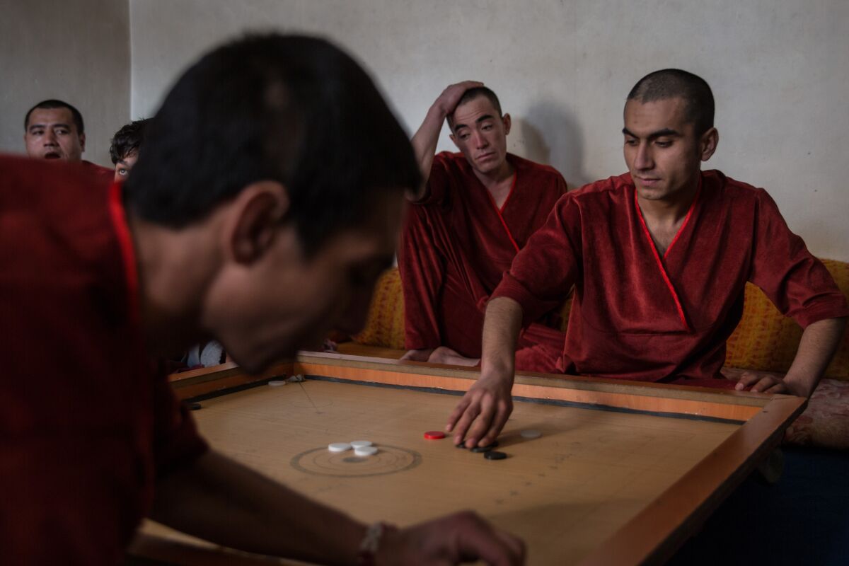 Drug addicts sit in their dormitory in Kabul, Afghanistan, in the shelter run by Laila Haidri.
