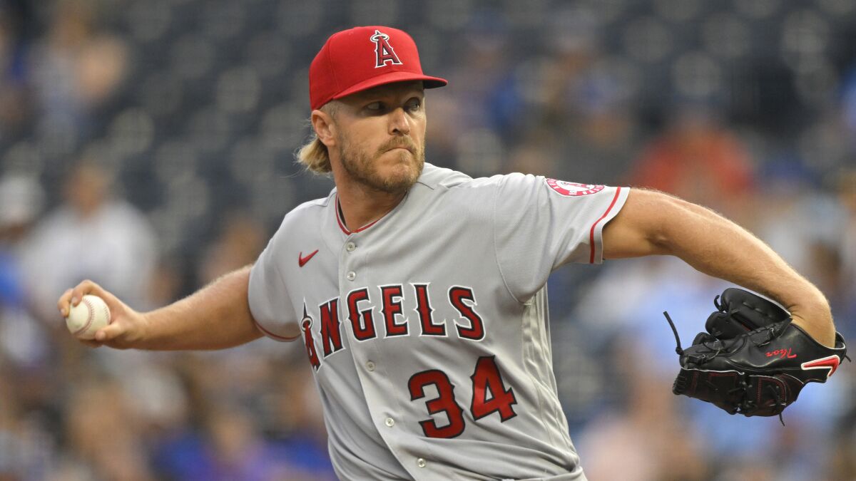 Angels starting pitcher Noah Syndergaard throws against the Kansas City Royals on Monday.