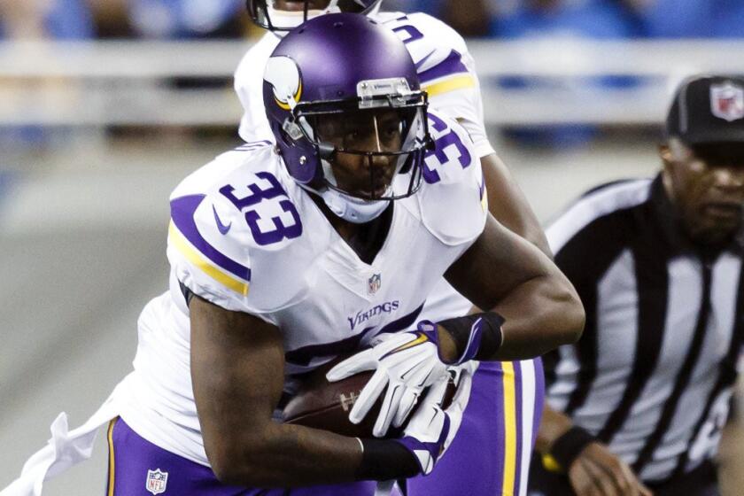 Minnesota Vikings running back Ben Tate carries the ball against the Detroit Lions on Dec. 14. Tate signed with the Pittsburgh Steelers on Tuesday.