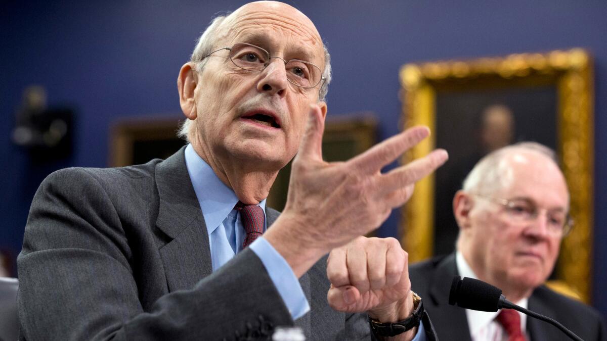 Justices Stephen Breyer, left, and Anthony Kennedy