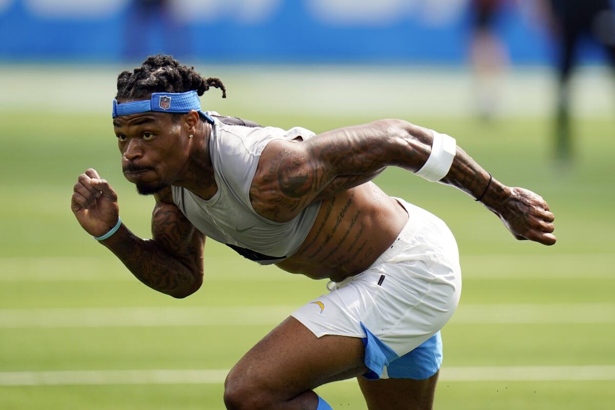 Los Angeles Chargers free safety Derwin James warms up before exhibition game in August.