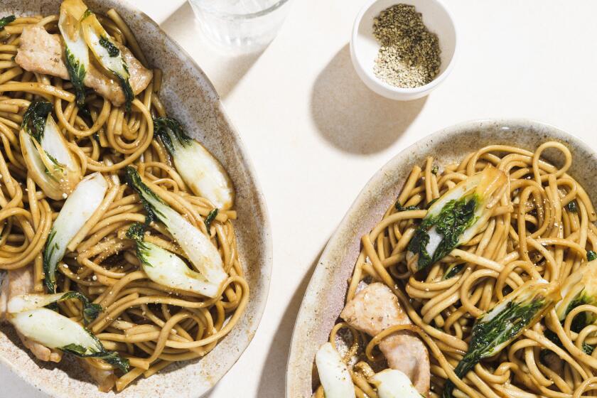 This image released by Milk Street shows a recipe for Shanghai-style fried noodles. (Milk Street via AP)