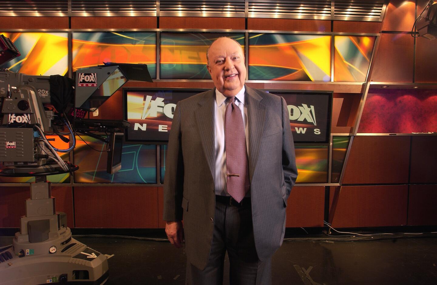 Former Fox News chief Roger Ailes, shown on the Fox News set, died on Thursday. He was 77.