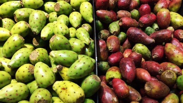 Green and ripe cactus pears at Northgate-Gonzales Market.