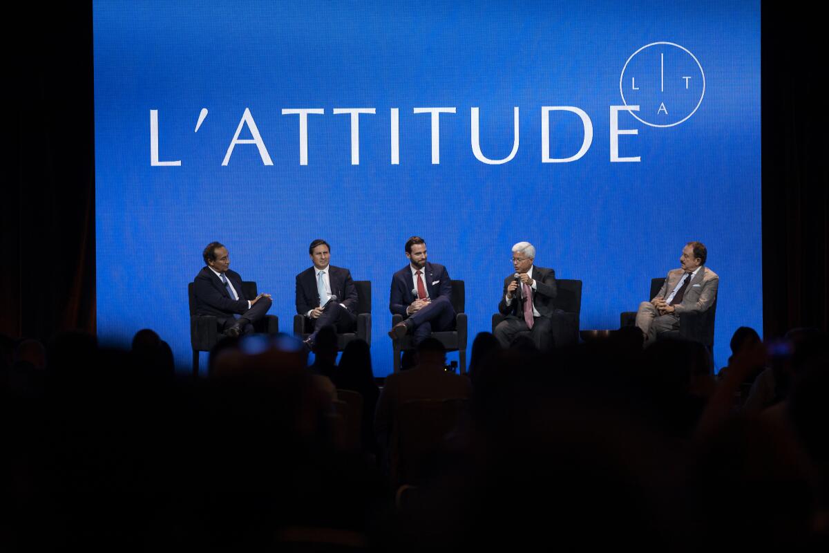 Latino chief executives of publicly traded companies speak during the L'Attitude conference.