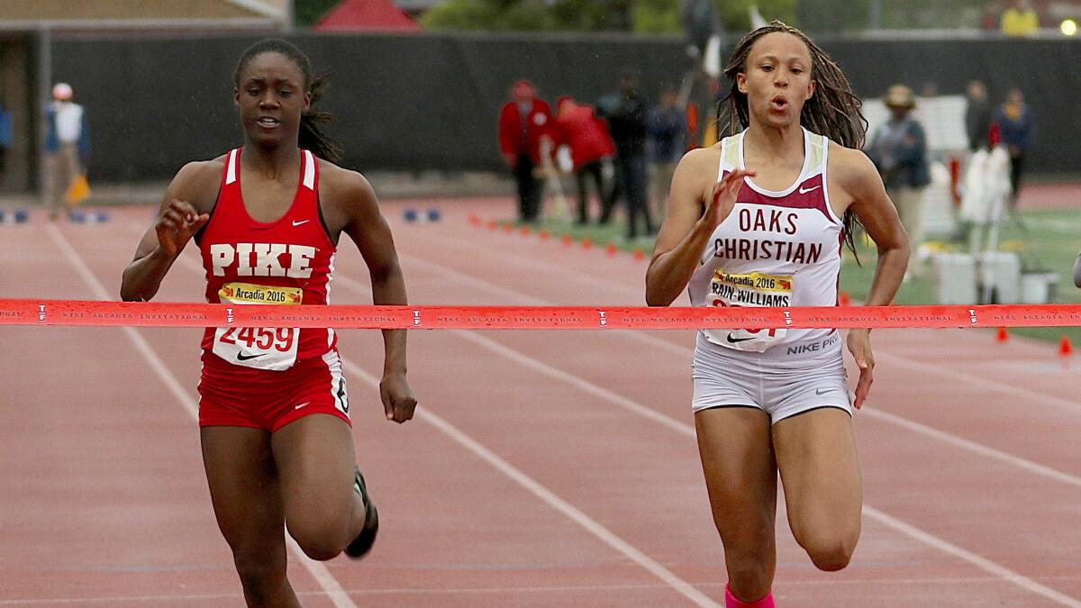 Oaks Christian junior Lauren Rain Williams wins the 200-meter dash over Lynna Irby of Pike in 11.64 seconds Saturday evening at the Arcadia Invitational.