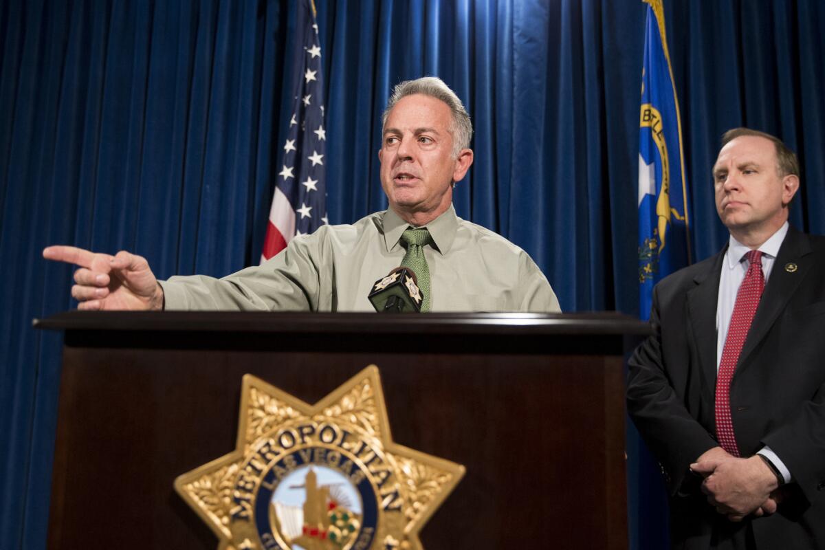 Clark County Sheriff Joe Lombardo, left, with Aaron C. Rouse, special agent in charge for the FBI in Nevada, discusses the Route 91 Harvest festival mass shooting at the Las Vegas Metropolitan Police Department headquarters in Las Vegas, Monday, Oct. 9, 2017.