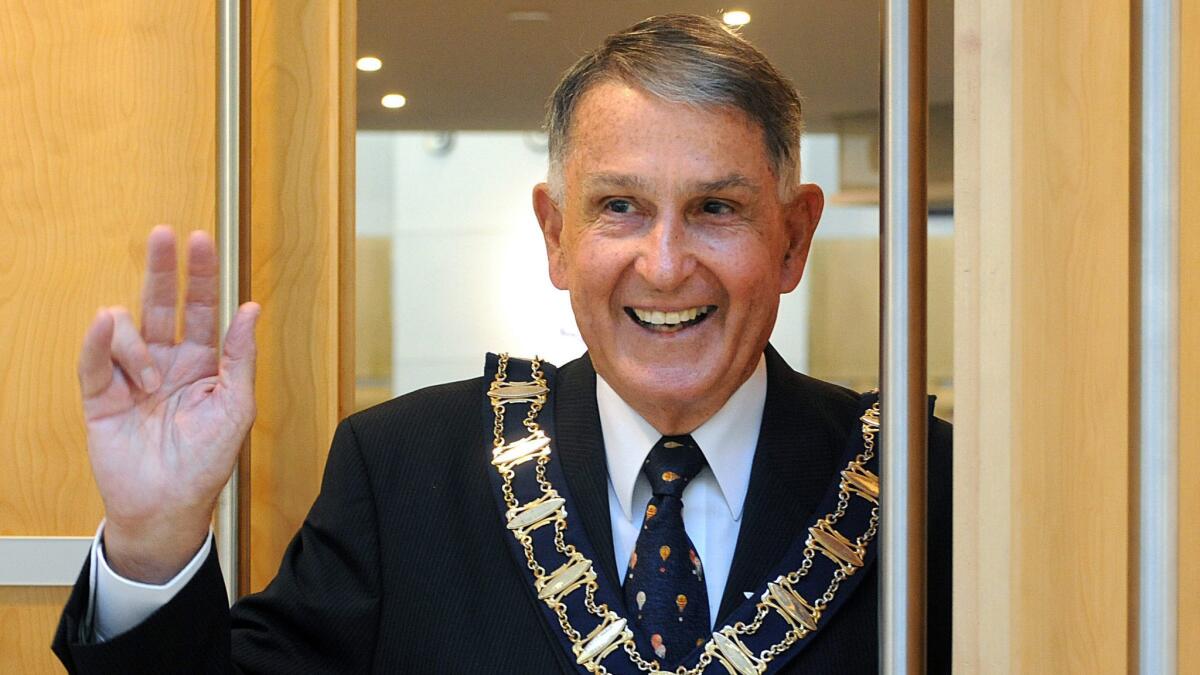 Australian running great Ron Clarke smiles during his mayoral swearing-in ceremony in Gold Coast, Australia, on March 31, 2008. Clarke died Wednesday at age 78.