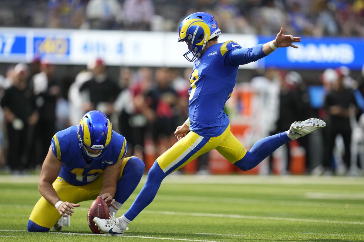 Brett Maher kicks a field goal for the Rams against the Arizona Cardinals in the first half.