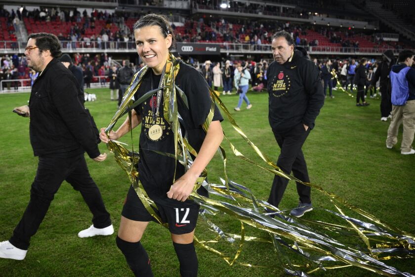 FILE - Portland Thorns FC forward Christine Sinclair (12) celebrates after the NWSL championship soccer match against the Kansas City Current, Saturday, Oct. 29, 2022, in Washington. The Portland Thorns' Christine Sinclair is one of just five players who helped launch the National Women's Soccer League in 2013 and are still with their same teams. (AP Photo/Nick Wass, File)