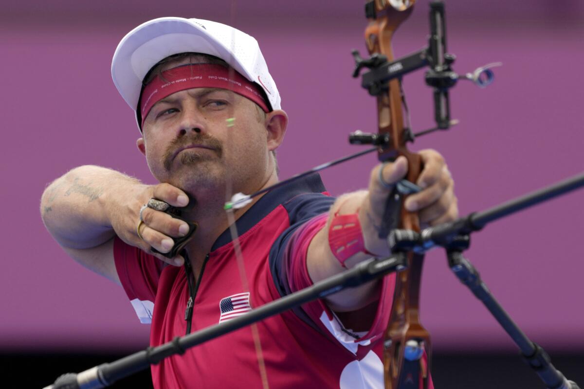U.S. archer Brady Ellison shoots at the Tokyo Olympics.