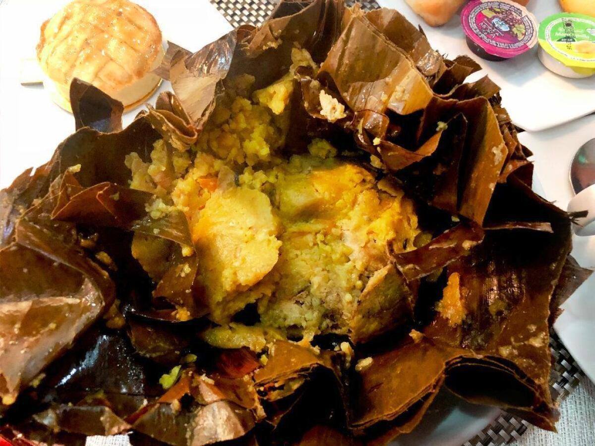 Colombia's large tamal tolimense typically contains a chicken leg, pork, carrots, peas, onions, egg and rice and are more moist and grainy and less crumbly than Mexican tamales.