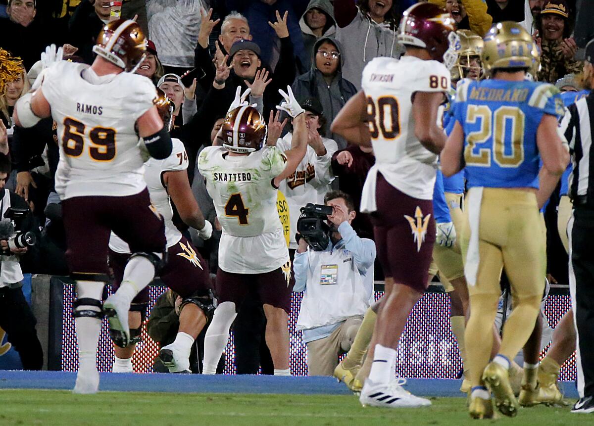 Arizona State running back Cameron Skattebo celebrates after scoring a touchdown in the fourth quarter.