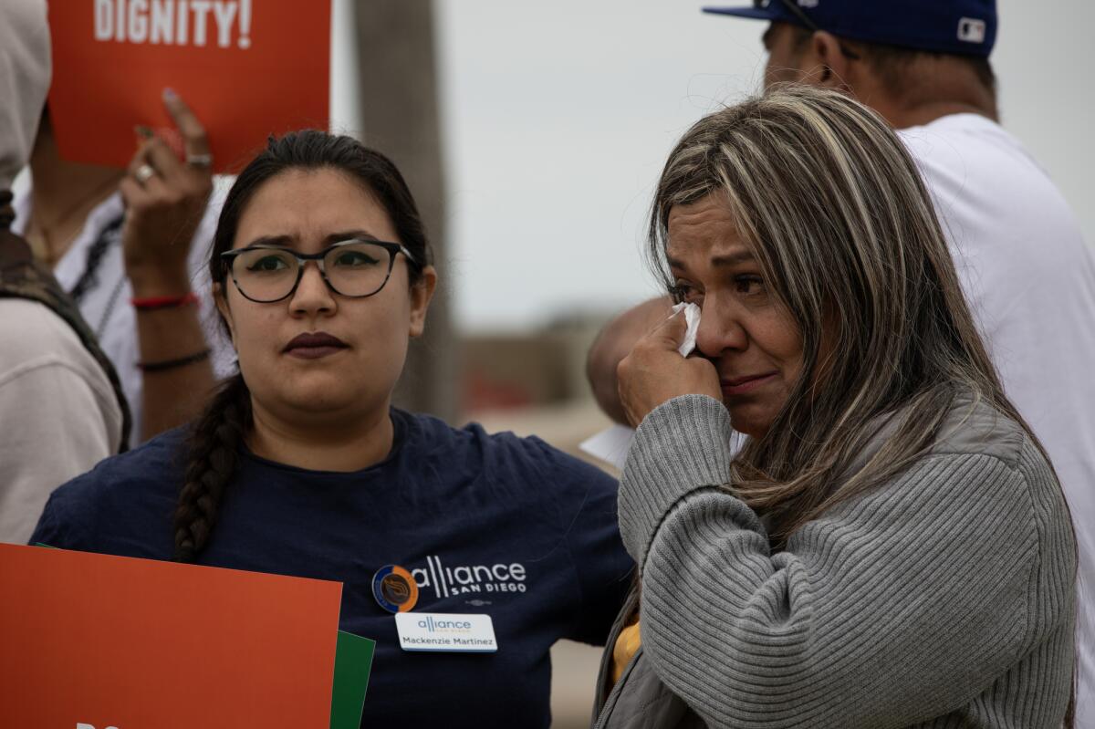 Araceli Rodriguez wipes tears from her eyes after talking about how her son was shot by a border patrol agent in 2012