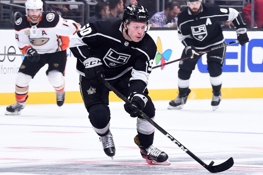 Kings center Jaret Anderson-Dolan controls the puck during a preseason game against the Ducks in September 2018.