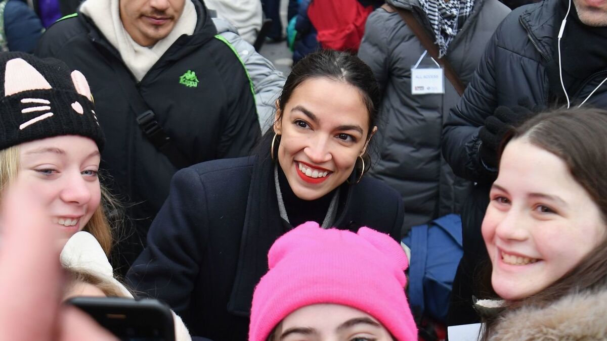 Rep. Alexandria Ocasio-Cortez (D-N.Y.), seen here at the women's march in New York this weekend, drives conservatives crazy--but they're shooting blanks.