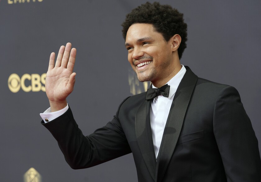 FILE - Trevor Noah arrives at the 73rd Primetime Emmy Awards on Sunday, Sept. 19, 2021, at L.A. Live in Los Angeles. Vice President Kamala Harris, The New York Times’ “The 1619 Project” and “The Daily Show with Trevor Noah,” as well as charitable programs from Airbnb, Google, PayPal and the National Football League, are among the finalists for the inaugural Anthem Awards announced Tuesday, Jan. 25, 2022. (AP Photo/Chris Pizzello, File)
