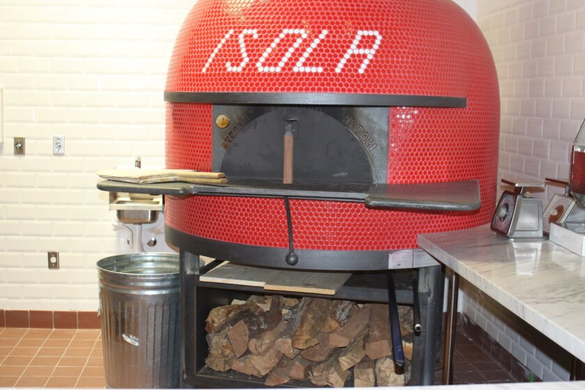 The wood-burning oven at Isola pizza bar will cook pizzas and other speciality dishes, when it opens later this month.