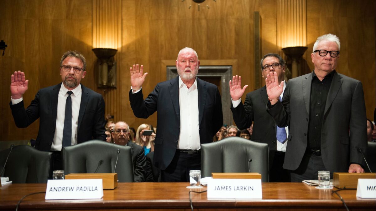 Backpage.com CEO Carl Ferrer, former owner James Larkin, COO Andrew Padilla, and former owner Michael Lacey, are sworn-in on Capitol Hill in Washington on Jan. 10, 2017.