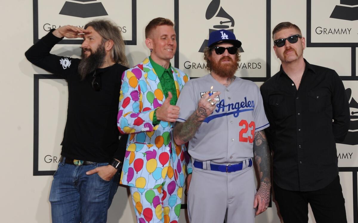 Mastodon, nominated for best metal performance, arrives on the red carpet for the 57th Annual Grammy Awards.