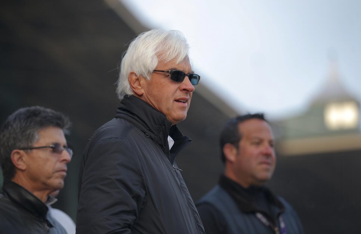 Trainer Bob Baffert watches his horses train on Wednesday in preparation for the Breeders' Cup this weekend at Santa Anita Park.