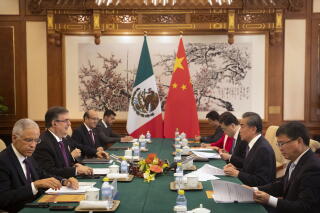 Mexican Foreign Relations Secretary Marcelo Ebrard, second from