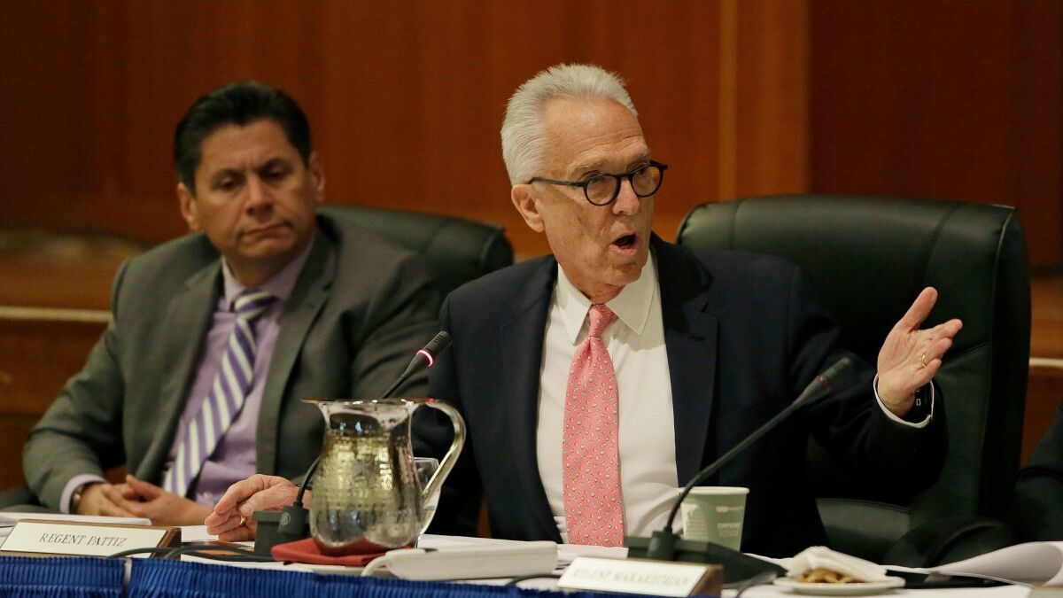 Norman J. Pattiz, right, shown at a UC Board of Regents meeting in March, apologized for his comments about a female podcaster's breasts. At left is Regent Eloy Ortiz Oakley.