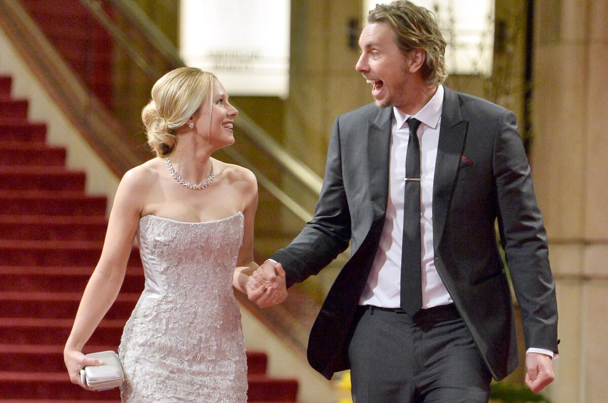 Kristen Bell and Dax Shepard are expecting a second child. They're seen leaving the Academy Awards in March.