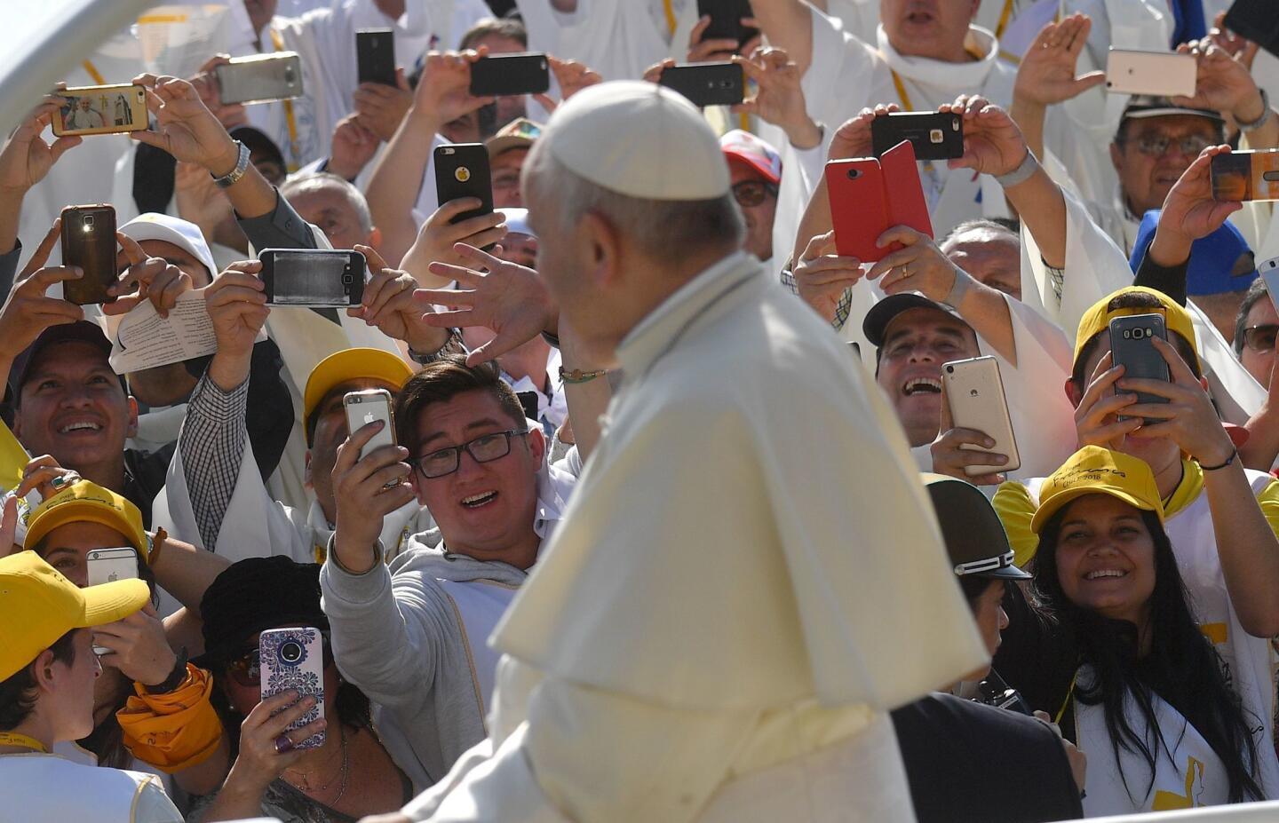 Pope Francis arrives to lead Mass at O'Higgins Park in Santiago, Chile, on Tuesday.