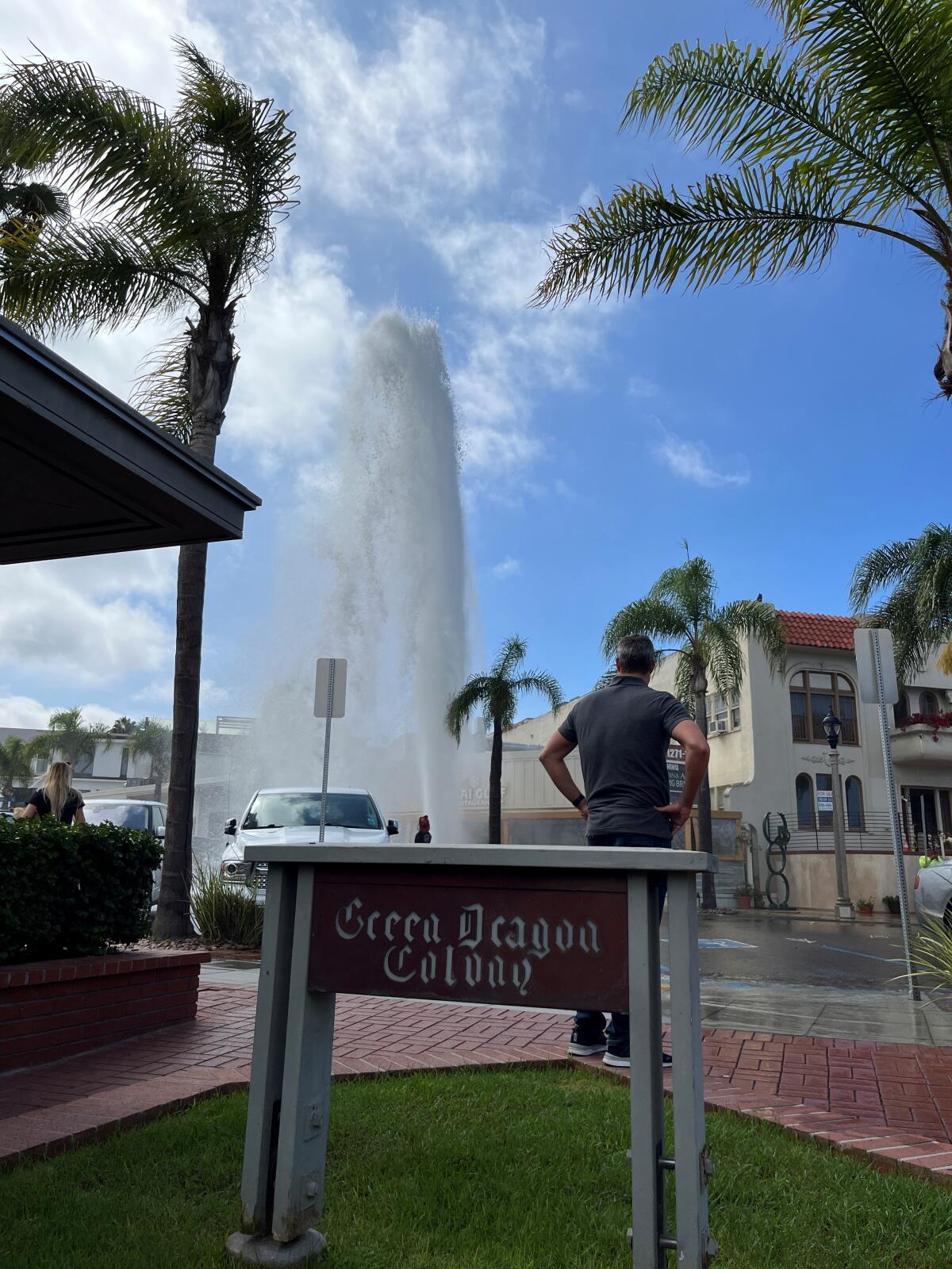 A geyser of water soars from a broken fire hydrant on Prospect Street in La Jolla on Sept. 14.