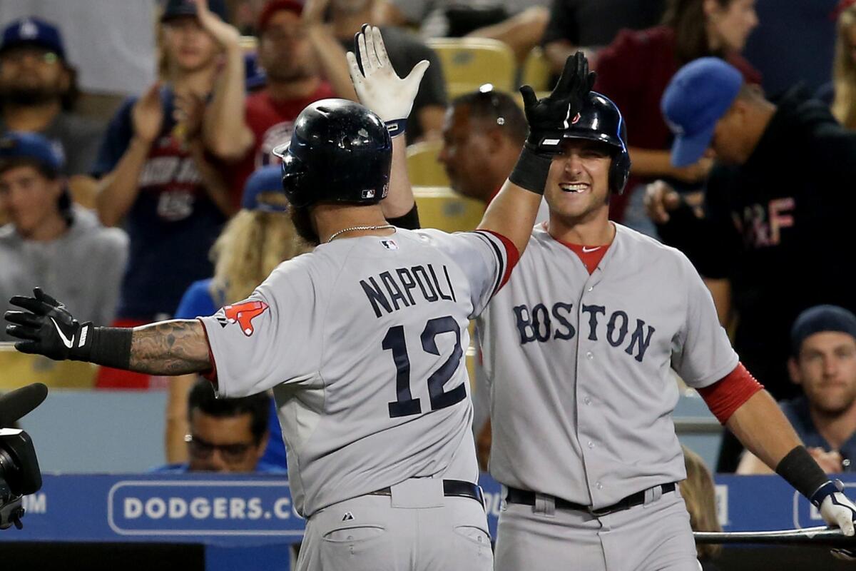 Mike Napoli's two-run home run played a key role in the Boston Red Sox's 8-1 win over the Dodgers on Sunday.
