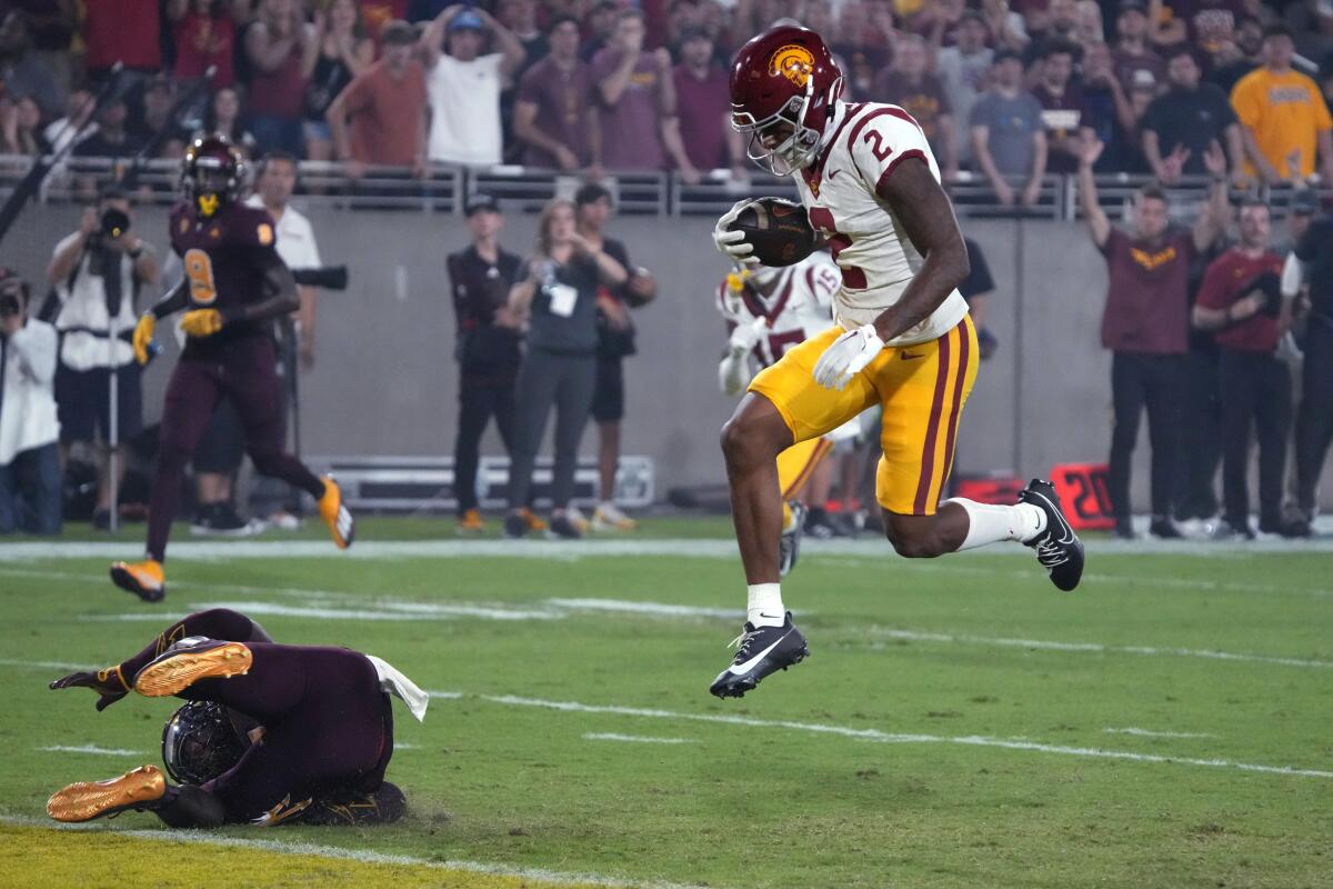 USC wide receiver Brenden Rice scores a touchdown against Arizona State.