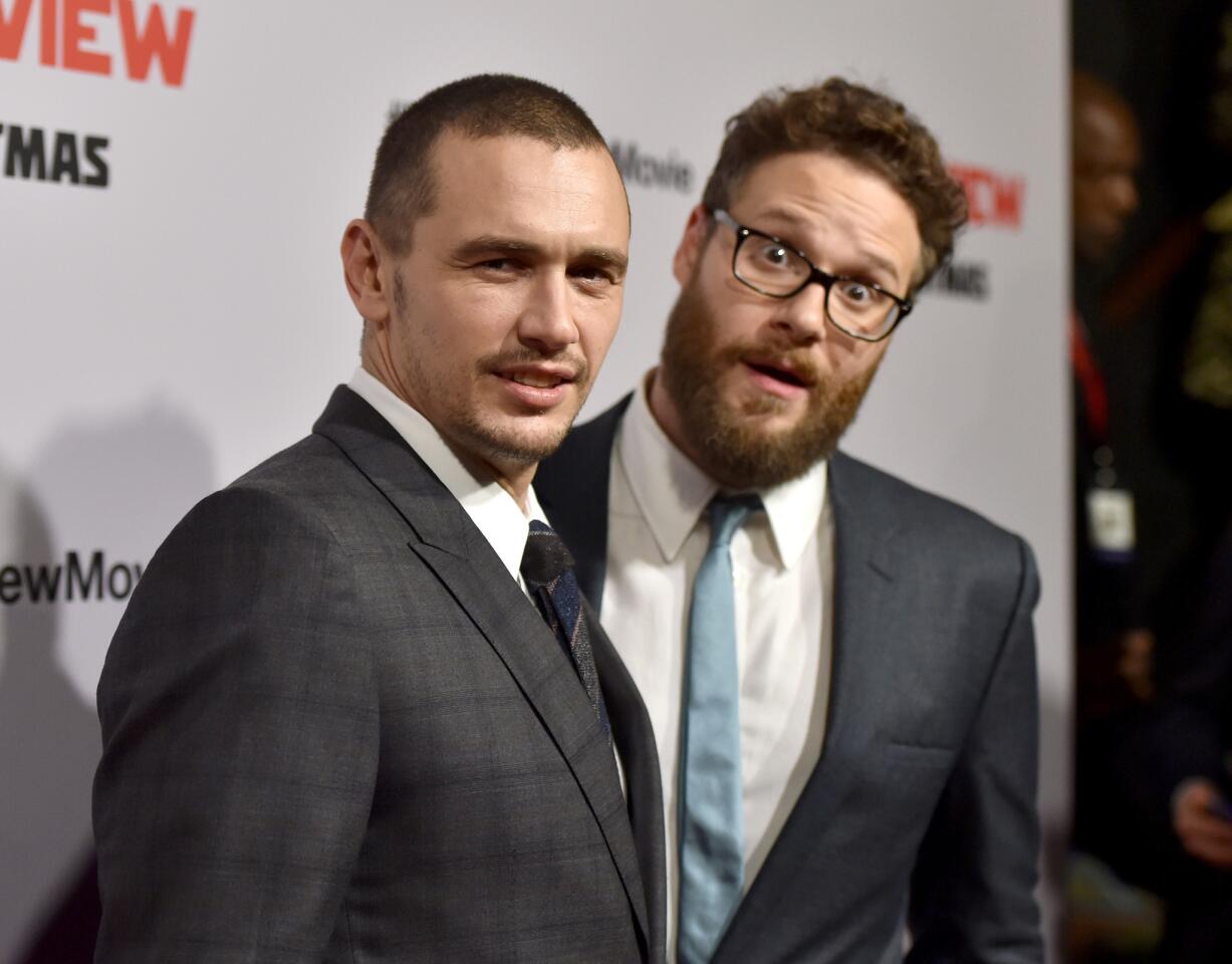 Stars James Franco, left, and Seth Rogen attend the premiere of Columbia Pictures' "The Interview" Thursday night in Los Angeles.