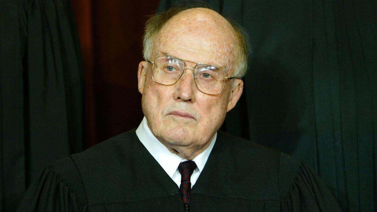 Then-Supreme Court Chief Justice William H. Rehnquist, shown during a group portrait session with the members of the U.S. Supreme Court, wrote that impeachments were "nonjusticiable," that is, a political question beyond the court’s authority.
