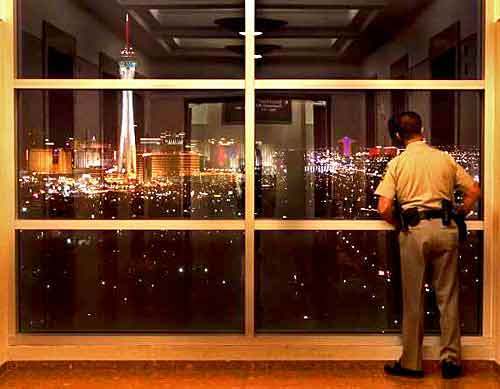 A sheriff's deputy looks out on the Las Vegas Strip from the new $185-million Clark County courthouse. "I don't think what goes on in Nevada bears any resemblance to a justice system," one Southern California lawyer said.
