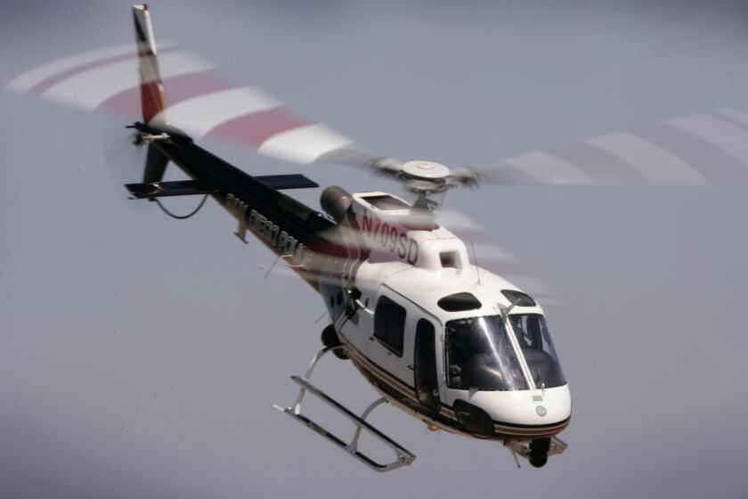 July 13, 2011- SAN DIEGO, CA- One of four San Diego Police Air Support Unit helicopters known as ABLE, leaves its Montgomery Field Airport base in Kearny Mesa for an afternoon patrol. Budget cuts are limiting the amount of hours it can fly, to two hours during the day and four hours at night. (Howard Lipin) /San Diego Union-Tribune). Mandatory Photo Credit: HOWARD LIPIN/San Diego Union-Tribune/ZUMA PRESS, San Diego Union-Tribune Publishing Company.
