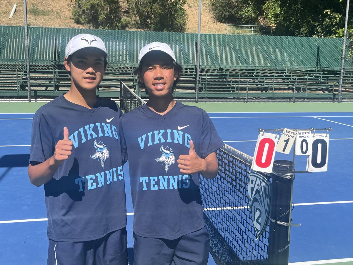 Marina High junior Trevor Nguyen, left, and sophomore David Tran advanced to the final four at the Ojai Tennis Tournament.